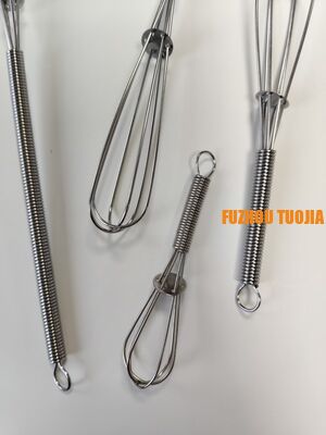 Stainless steel mini mixing whisk for baking. Stirring rod. Home use for whipping cream and beating egg whites. Manual egg whisk set of 4 pieces.